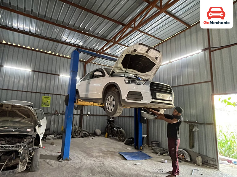 car in workshop getting treated